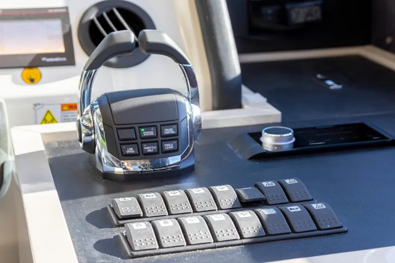 Slide: The Image of Control panel of 2018 Cranchi Eco Trawler 53 Long Distance yacht, featuring modern navigation controls. - 114