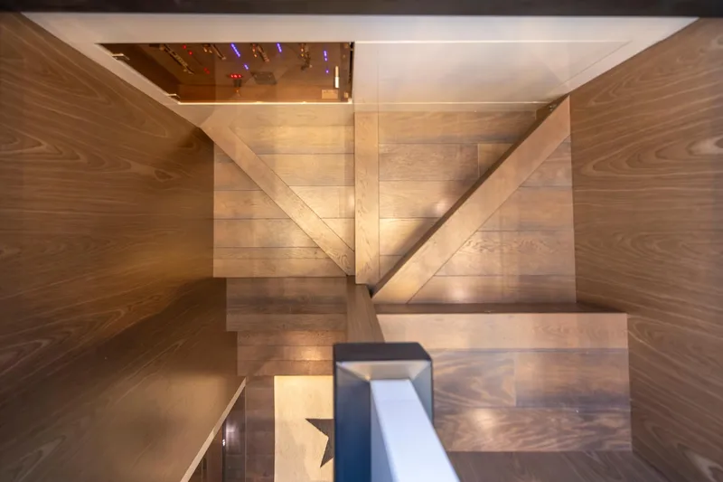 Slide: The Image of Wooden staircase inside 2018 Cranchi Eco Trawler 53 Long Distance yacht, top view. - 127
