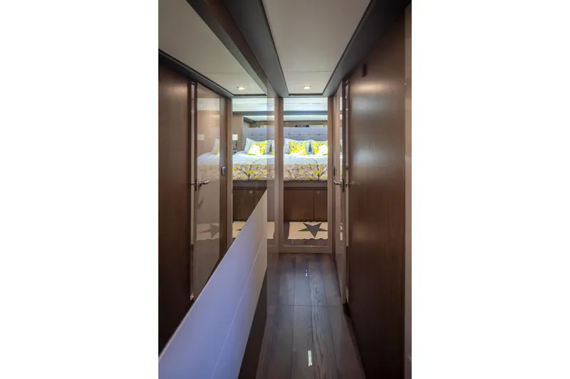 Slide: The Image of 2018 Cranchi Eco Trawler 53 Long Distance interior hallway with modern wood finish. - 130
