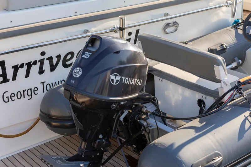 Slide: The Image of 2018 Cranchi Eco Trawler 53 with Tohatsu outboard motor, docked in George Town. - 148