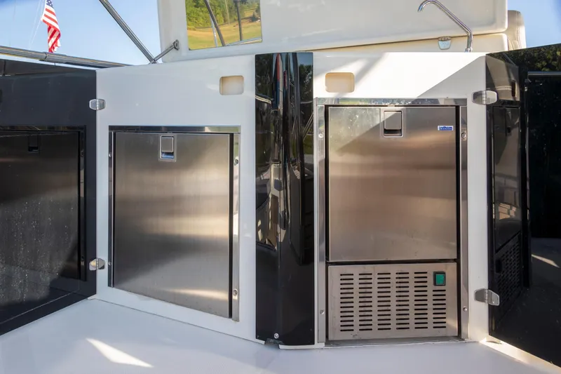 Slide: The Image of 2018 Cranchi Eco Trawler 53 Long Distance yacht with stainless steel storage compartments. - 20