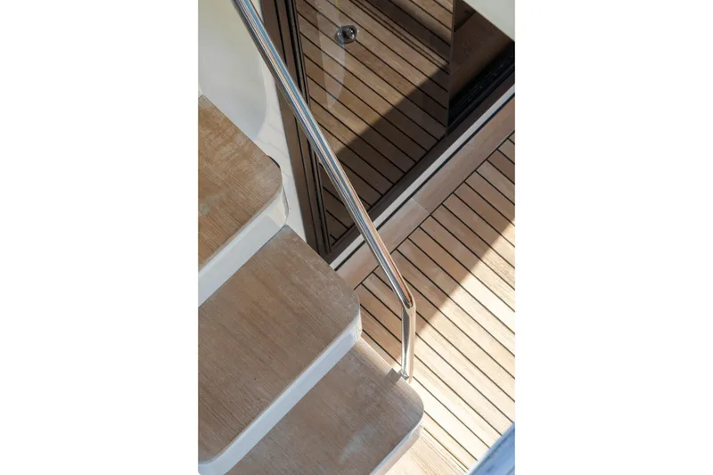 Slide: The Image of Staircase and deck of 2018 Cranchi Eco Trawler 53 Long Distance yacht. - 40