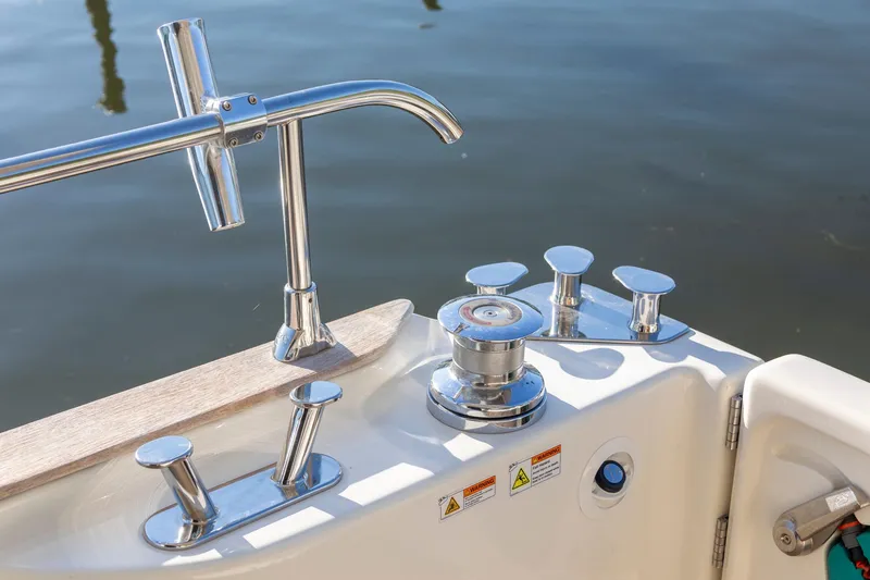 Slide: The Image of 2018 Cranchi Eco Trawler 53 Long Distance deck with chrome fittings and winch. - 54