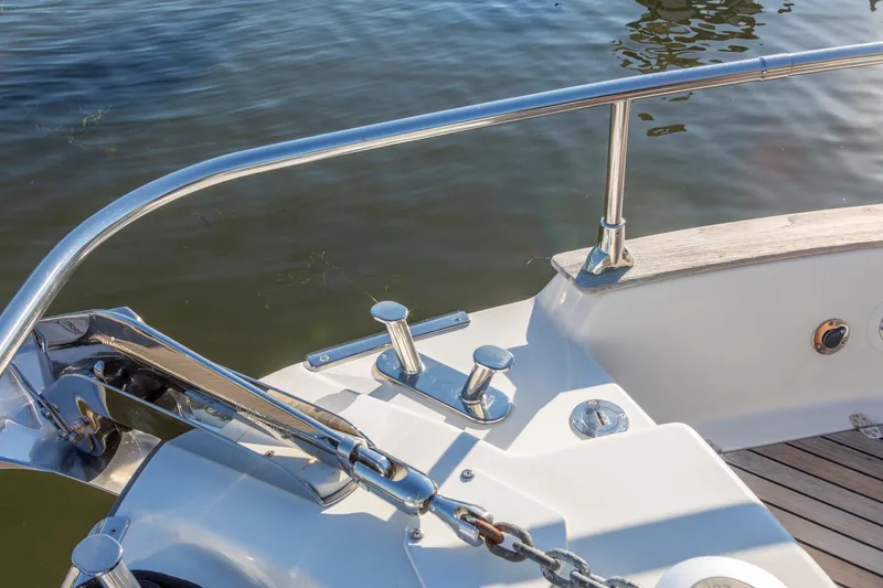 Slide: The Image of 2018 Cranchi Eco Trawler 53 Long Distance boat deck with railing and cleats. - 73