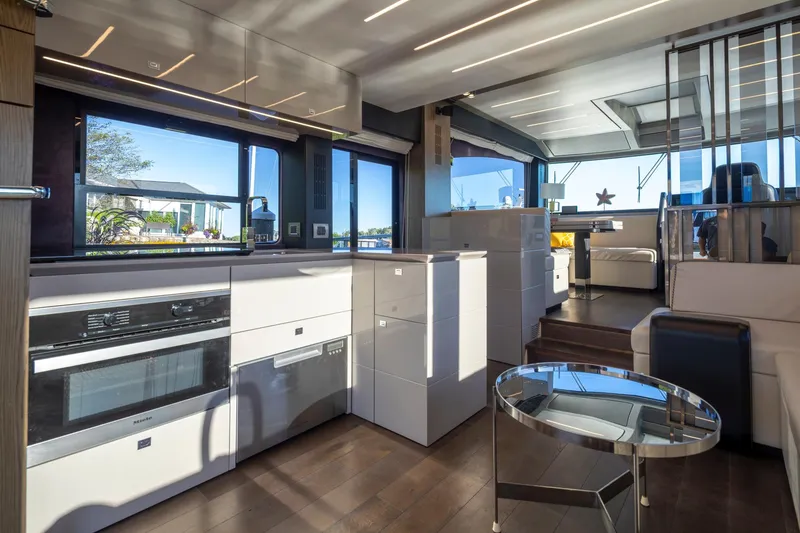 Slide: The Image of Luxurious interior of 2018 Cranchi Eco Trawler 53 Long Distance yacht with modern kitchen and seating area. - 89