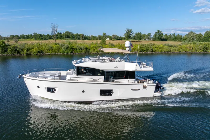 Slide: The Image of 2018 Cranchi Eco Trawler 53 Long Distance cruising on a scenic river. - 9
