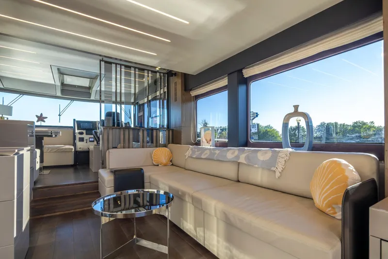 Slide: The Image of Luxurious interior of 2018 Cranchi Eco Trawler 53 Long Distance with modern decor and large windows. - 90