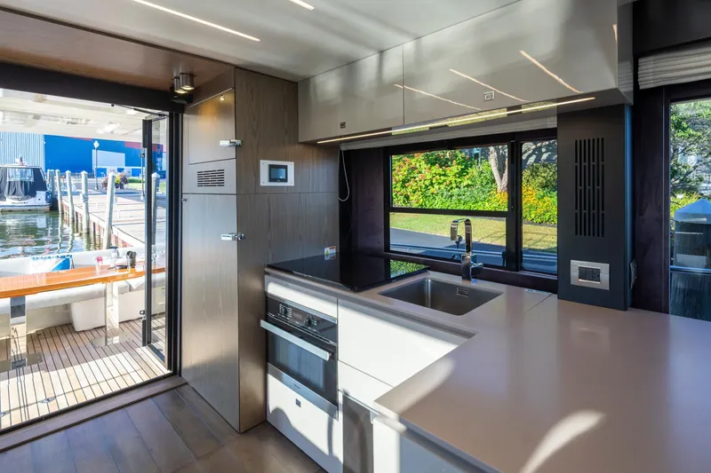 Slide: The Image of Modern kitchen interior of 2018 Cranchi Eco Trawler 53 Long Distance yacht. - 96