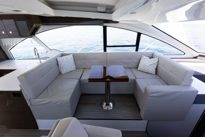 Slide: The Image of Luxurious interior of 2019 Cruisers Yachts 50 Cantius with elegant seating and ocean view. - 26