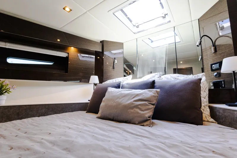 Slide: The Image of Luxurious bedroom interior of 2019 Cruisers Yachts 50 Cantius with skylight and modern decor. - 32