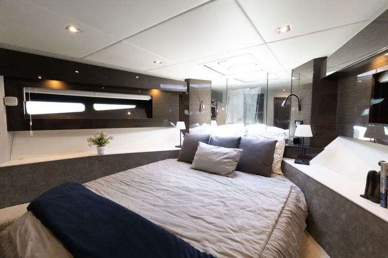 Slide: The Image of Luxurious bedroom interior of 2019 Cruisers Yachts 50 Cantius with modern design and cozy bedding. - 34