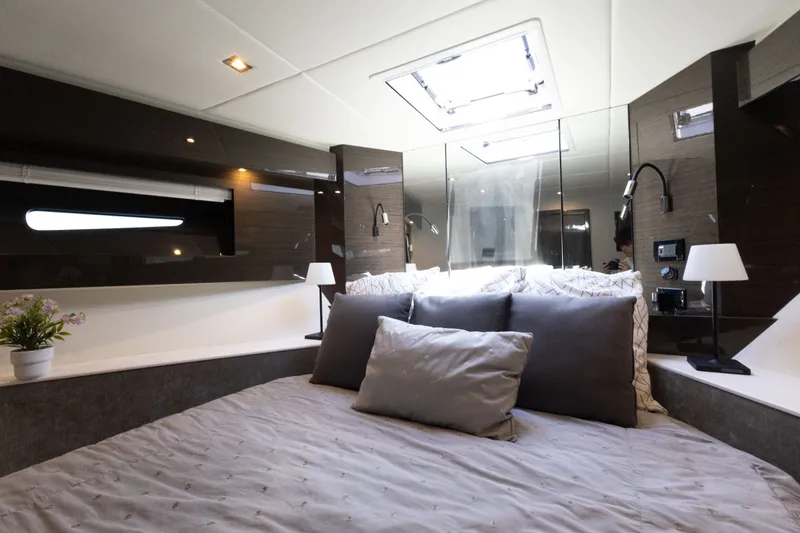 Slide: The Image of Luxurious bedroom interior of 2019 Cruisers Yachts 50 Cantius with modern decor and skylight. - 35