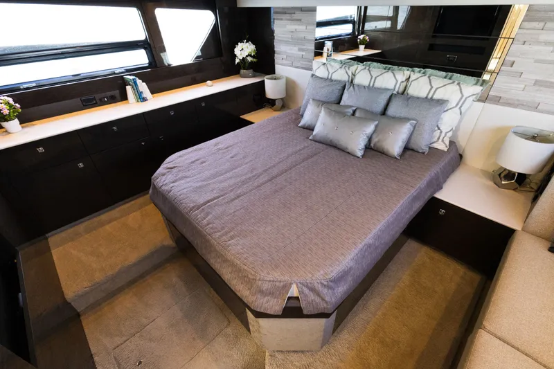 Slide: The Image of Luxurious bedroom interior of 2019 Cruisers Yachts 50 Cantius with elegant bedding and decor. - 43