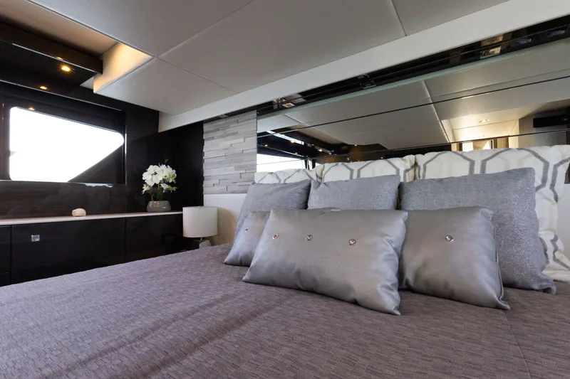Slide: The Image of Luxurious bedroom interior of 2019 Cruisers Yachts 50 Cantius with elegant decor and plush pillows. - 44