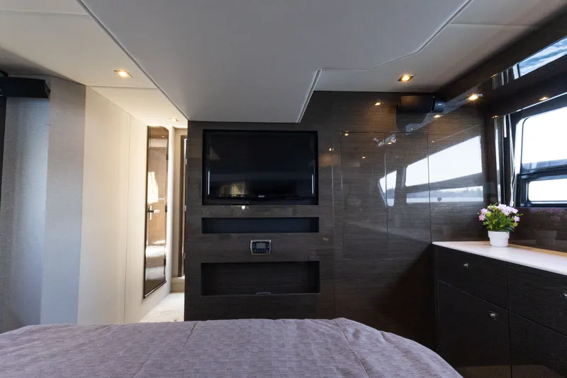 Slide: The Image of Luxurious interior of 2019 Cruisers Yachts 50 Cantius with TV and elegant decor. - 45
