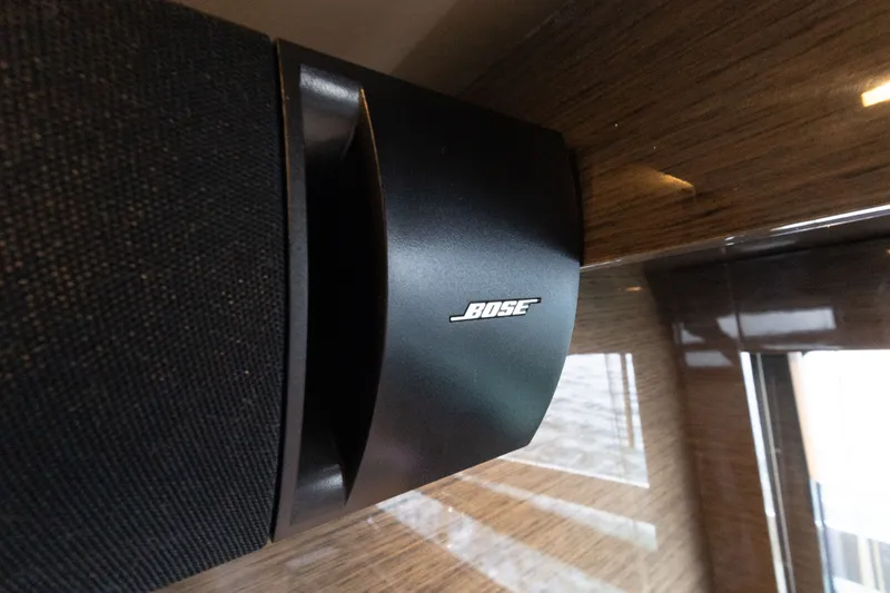 Slide: The Image of Bose speaker on 2019 Cruisers Yachts 50 Cantius, mounted on wooden panel. - 47