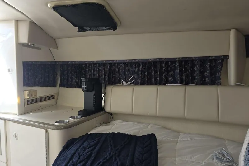 Slide: The Image of Interior of 2002 Formula 330 Sun Sport boat with bed and coffee maker. - 21