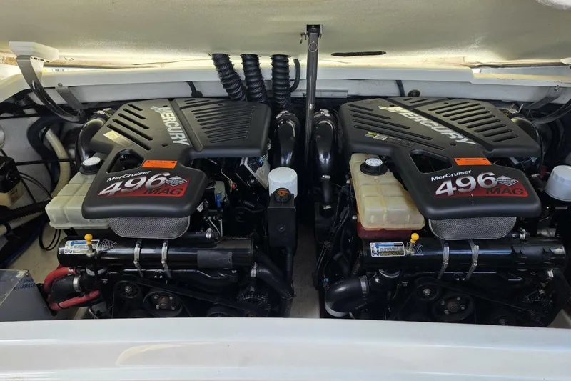 Slide: The Image of Twin MerCruiser 496 MAG engines in a 2002 Formula 330 Sun Sport boat. - 29