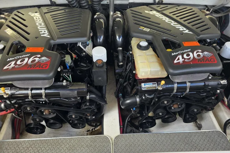 Slide: The Image of Twin MerCruiser 496 MAG engines in a 2002 Formula 330 Sun Sport boat. - 30