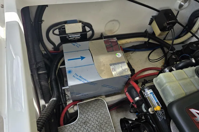 Slide: The Image of Engine compartment of a 2002 Formula 330 Sun Sport boat, showing wiring and components. - 31