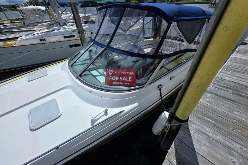 Slide: The Image of 2002 Formula 330 Sun Sport boat docked with "For Sale" sign displayed. - 35