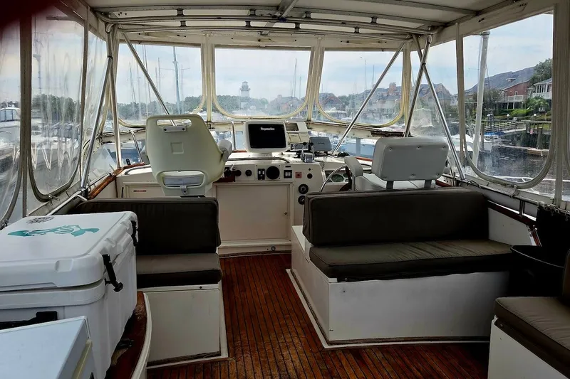 Slide: The Image of Interior view of 1989 Grand Banks 42 Classic yacht with helm and seating area. - 10