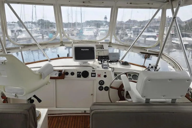 Slide: The Image of Interior view of 1989 Grand Banks 42 Classic yacht helm with navigation equipment. - 11