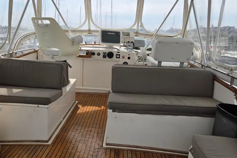 Slide: The Image of Interior of 1989 Grand Banks 42 Classic yacht with helm and seating area. - 8