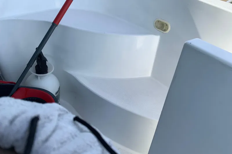 Slide: The Image of Staircase on 2004 Carver 570 Voyager Pilothouse yacht with cleaning supplies. - 33