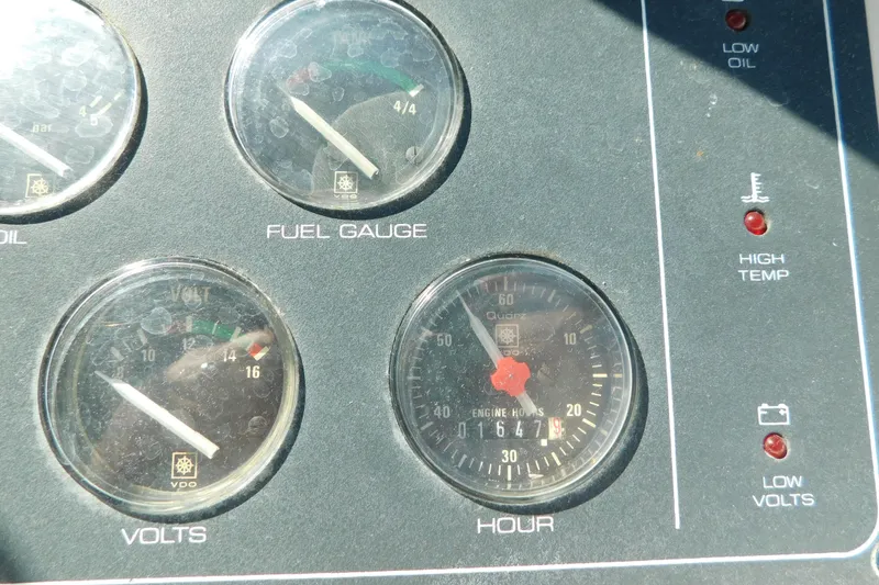Slide: The Image of Close-up of 1993 Tiara Yachts 3100 Open dashboard gauges and warning lights. - 37