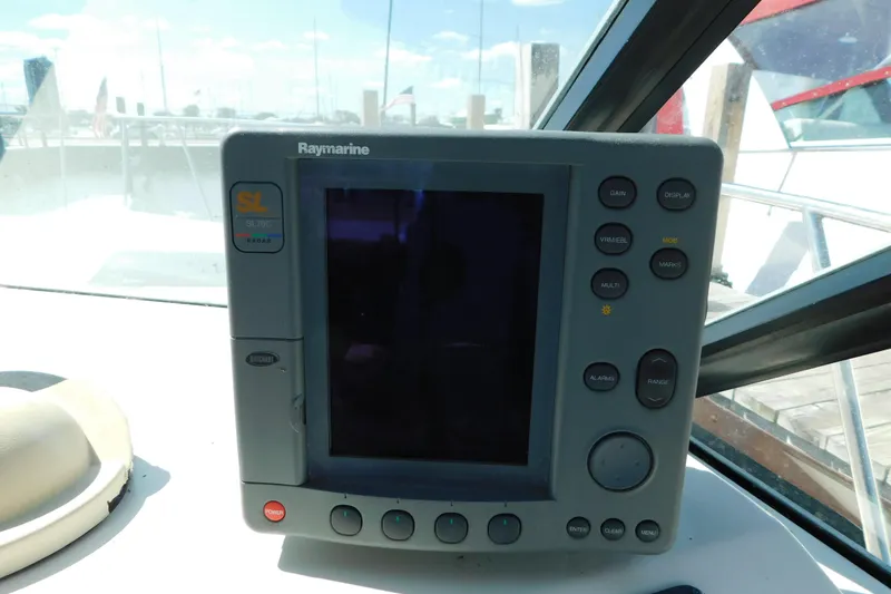 Slide: The Image of Raymarine SL70C radar display on 1993 Tiara Yachts 3100 Open boat dashboard. - 38