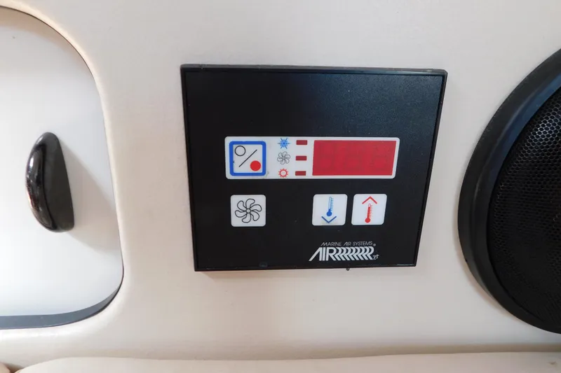 Slide: The Image of Control panel of a 1993 Tiara Yachts 3100 Open, featuring Marine Air Systems. - 61