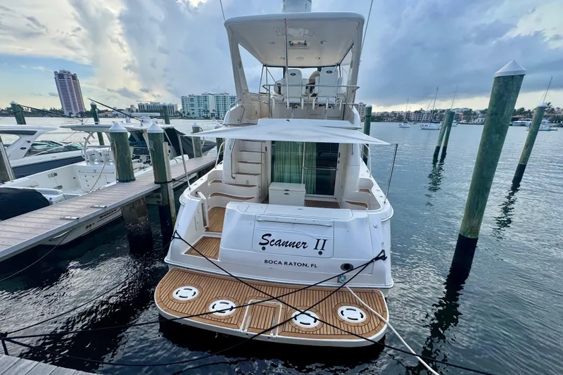 The Image of 1998 Sea Ray 480 Sedan Bridge yacht docked in marina, Boca Raton, Florida. - 0