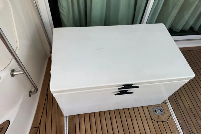 Slide: The Image of White storage box on teak deck of 1998 Sea Ray 480 Sedan Bridge yacht. - 37