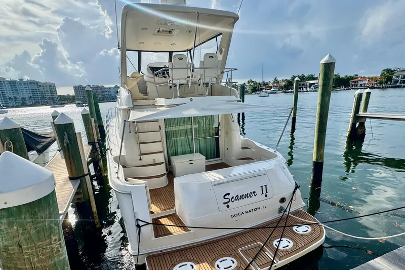Slide: The Image of 1998 Sea Ray 480 Sedan Bridge yacht docked at marina, Boca Raton, Florida. - 5