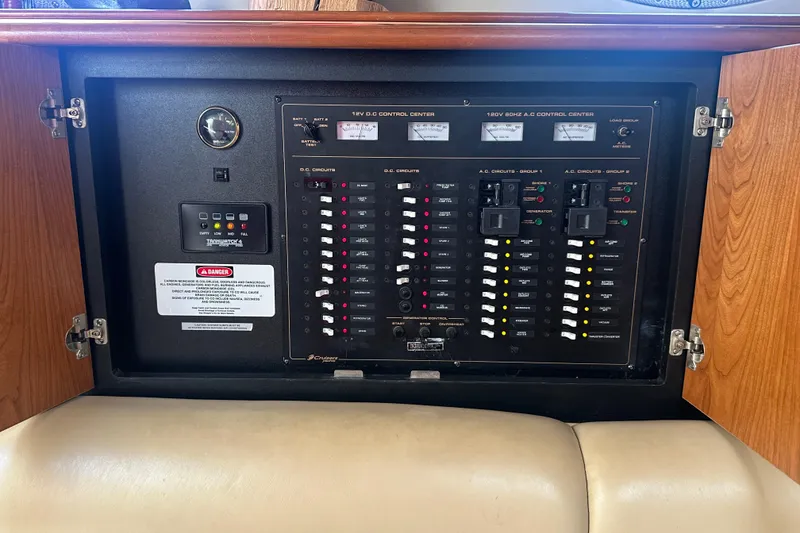 Slide: The Image of Electrical control panel of 2001 Cruisers Yachts 3870 Express boat. - 3
