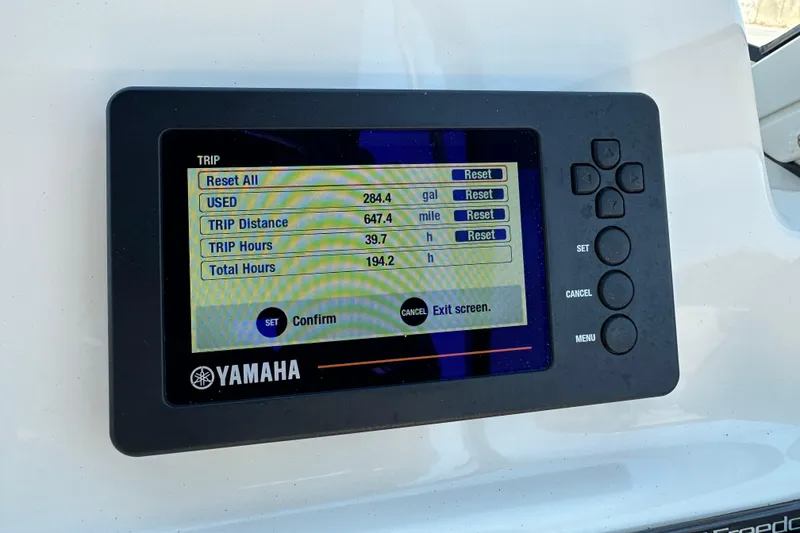 Slide: The Image of Yamaha display on 2018 Grady-White Freedom 215 showing trip data and settings. - 18