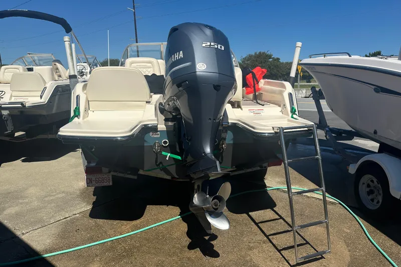 Slide: The Image of 2018 Grady-White Freedom 215 boat with Yamaha 250 engine, parked on a sunny day. - 3