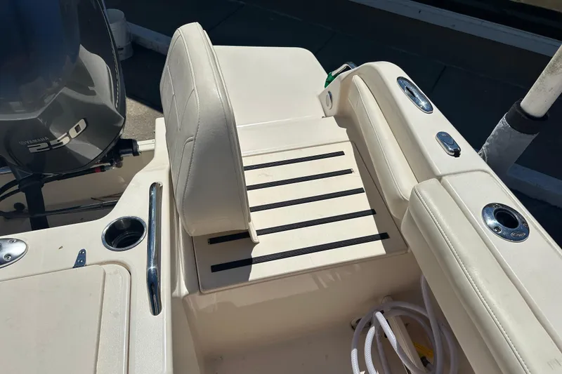 Slide: The Image of 2018 Grady-White Freedom 215 boat interior with Yamaha 250 engine. - 31