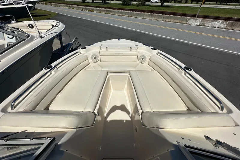 Slide: The Image of 2018 Grady-White Freedom 215 boat with spacious seating and sleek design. - 6
