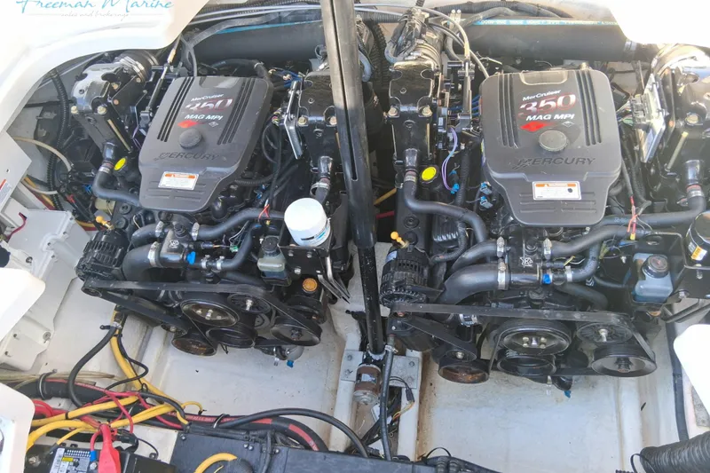 Slide: The Image of Twin Mercury 350 MAG MPI engines in a 2007 Crownline 320 LS boat. - 36