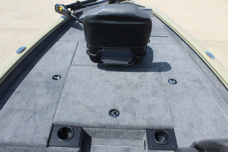 Slide: The Image of 2026 Tracker Pro Team 175 boat deck with seating and storage compartments. - 12