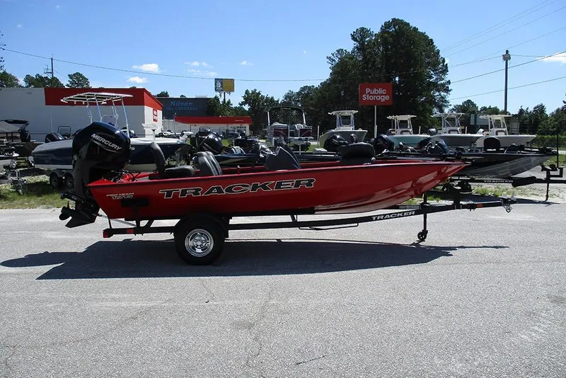 The Image of 2026 Tracker Pro Team 175 boat on trailer in outdoor storage lot. - 1