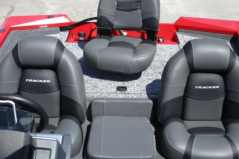 Slide: The Image of 2026 Tracker Pro Team 175 boat interior with gray seats and red accents. - 20
