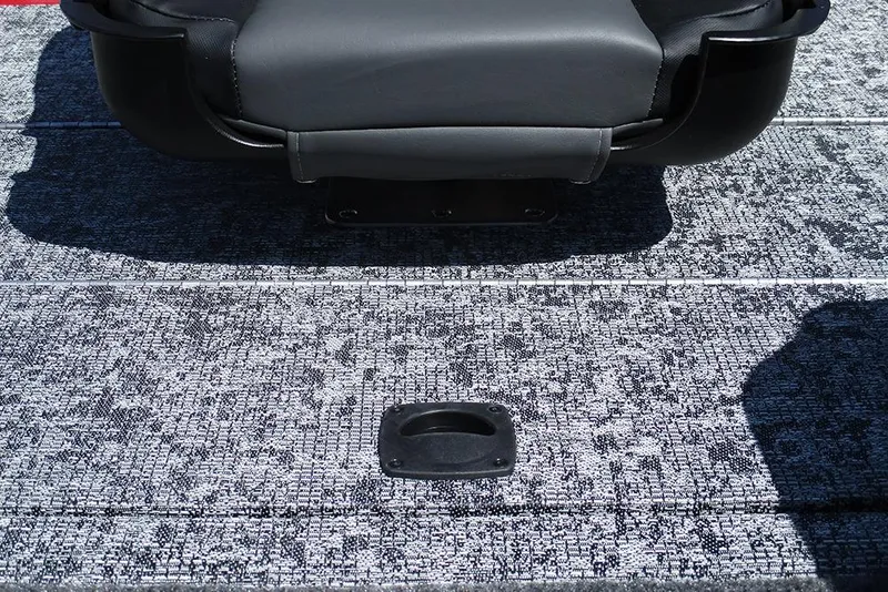Slide: The Image of 2026 Tracker Pro Team 175 boat seat and textured deck surface. - 24