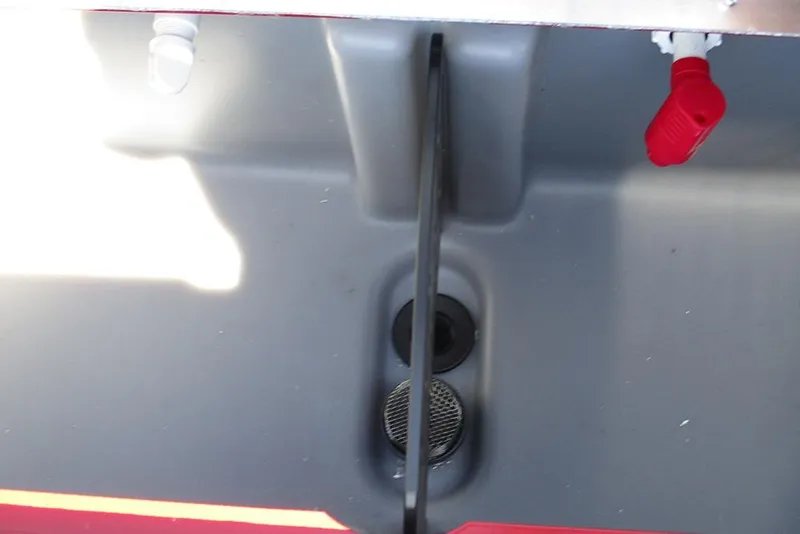 Slide: The Image of Interior view of 2026 Tracker Pro Team 175 boat with red and gray components. - 26