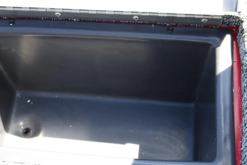 Slide: The Image of Open storage compartment in 2026 Tracker Pro Team 175 boat. - 29