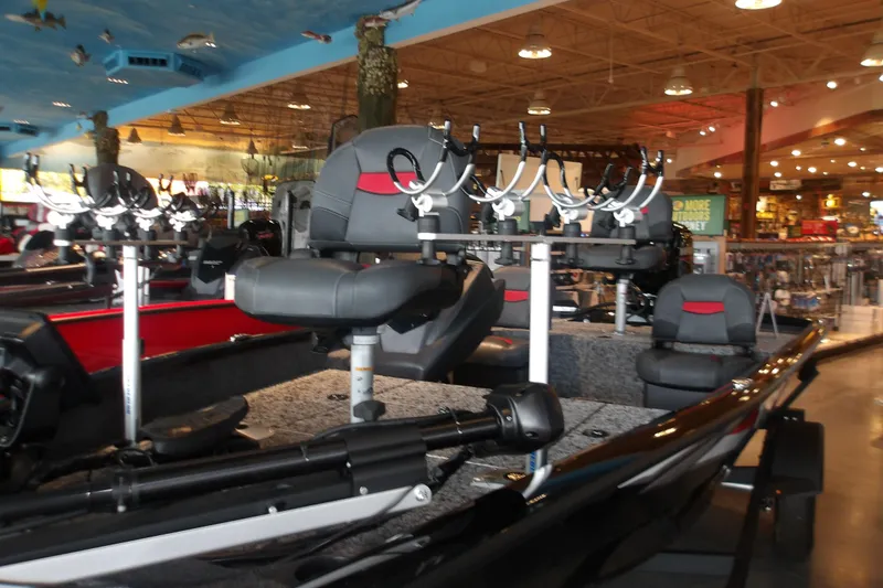 Slide: The Image of 2026 Tracker Pro Team 175 Crappie Edition boat displayed in a showroom. - 3