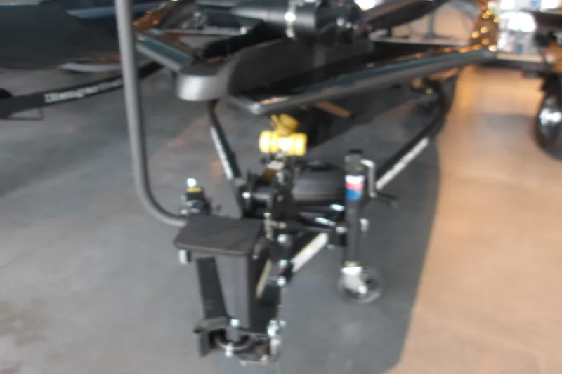 Slide: The Image of 2026 Tracker Pro Team 175 Crappie Edition boat trailer in a showroom. - 14