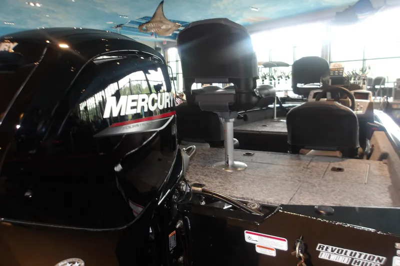 Slide: The Image of 2026 Tracker Pro Team 175 Crappie Edition boat with Mercury engine in showroom. - 9